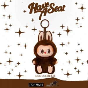 Игрушка Лабубу LABUBU на брелке - Коричневый сидит (серия 2)